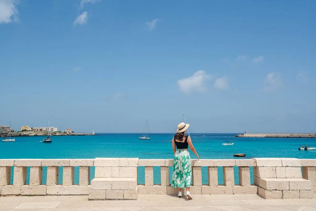 kate storm overlooking the sea on a balcony in otranto puglia