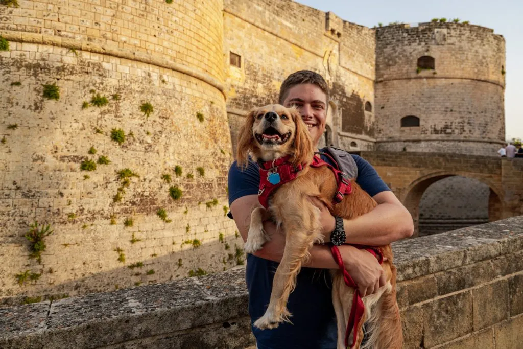 jeremy storm and ranger storm standing in front of the castle of otranto italy