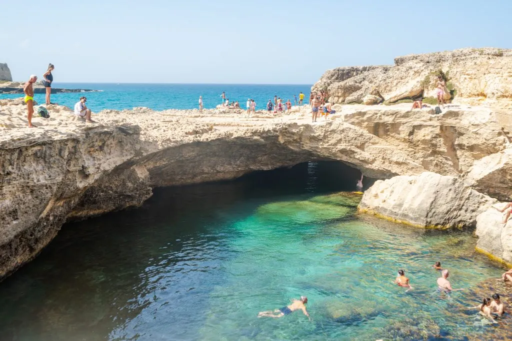 cave of poetry italy as seen from above with half the swimming pool showing
