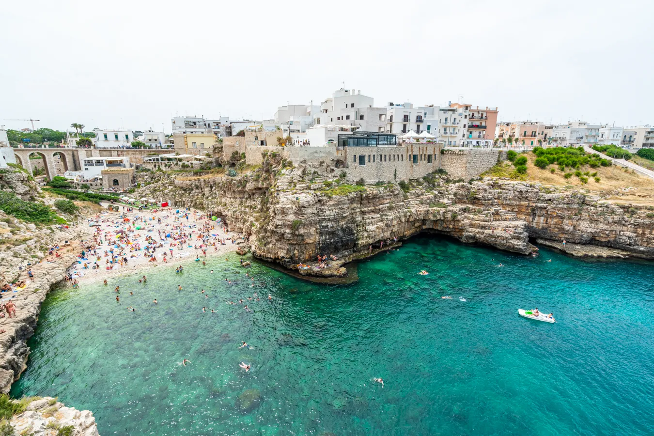 famous beach of polignano a mare as seen from above on a puglia road trip itinerary