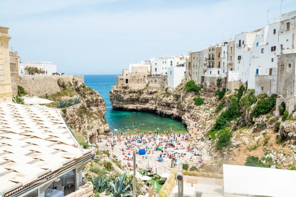famous inlet beach of polignano a mare, as seen during a road trip in puglia italy