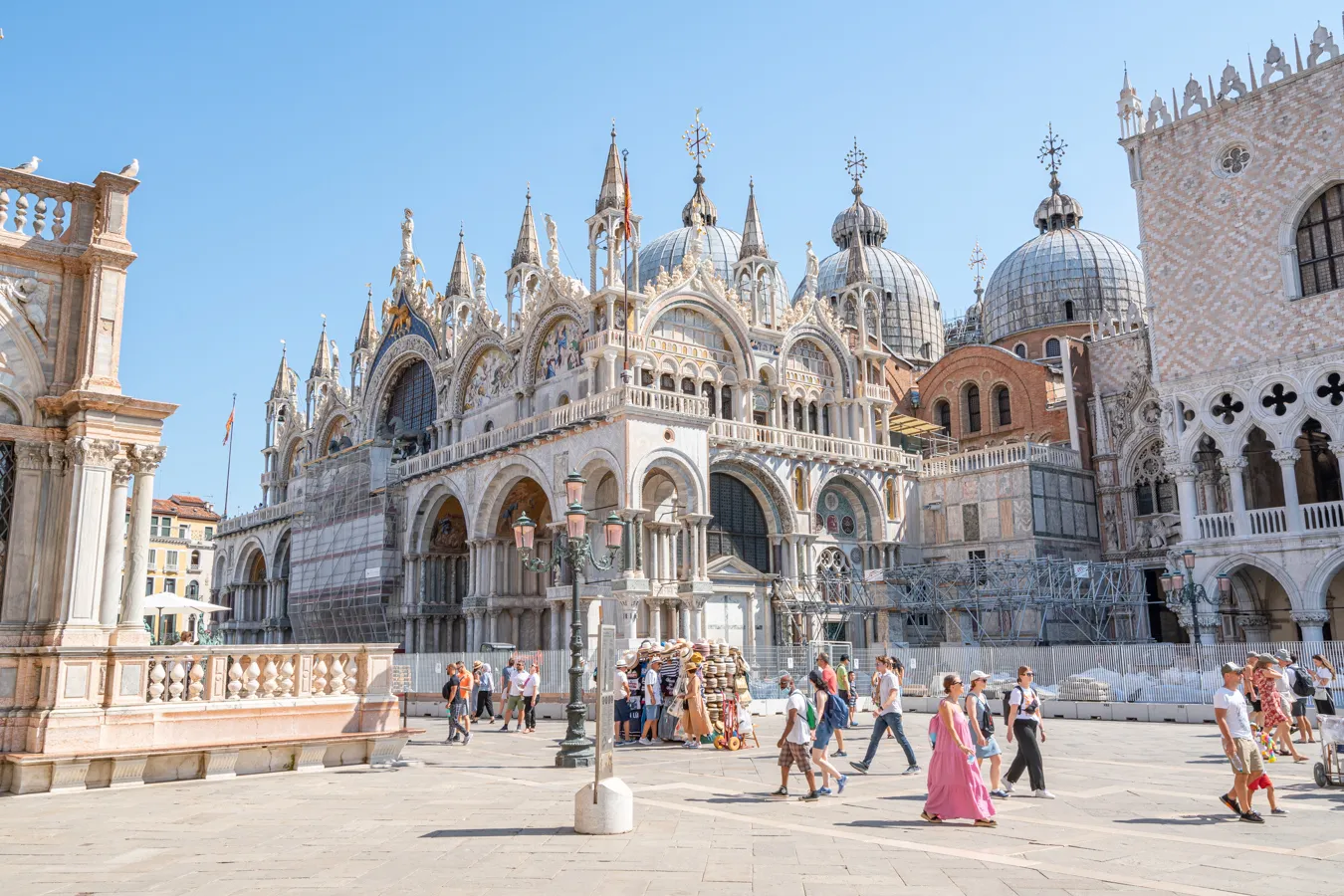 tourists in front of st marks basilica in venice italy during july