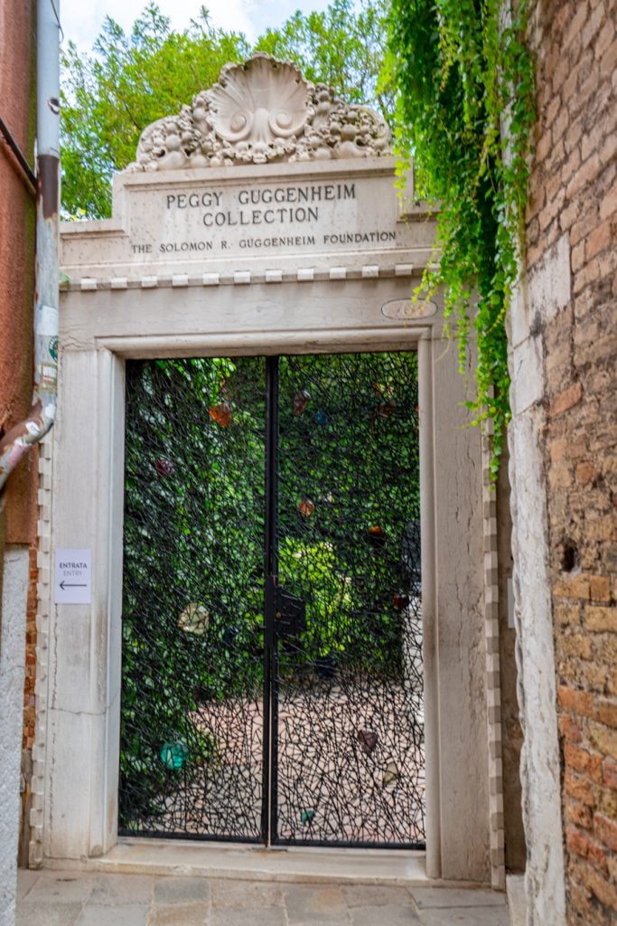 front gate marking the entrance of the peggy guggenheim collection in venice italy