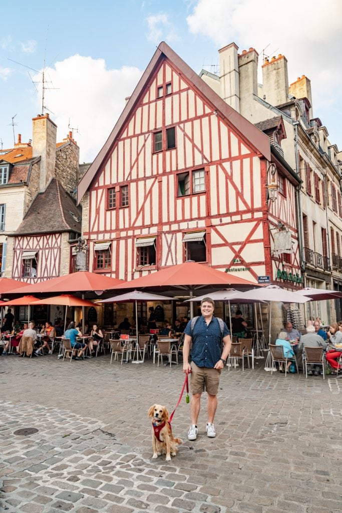 jeremy storm and ranger storm standing in front of a half timbered house when visiting dijon france