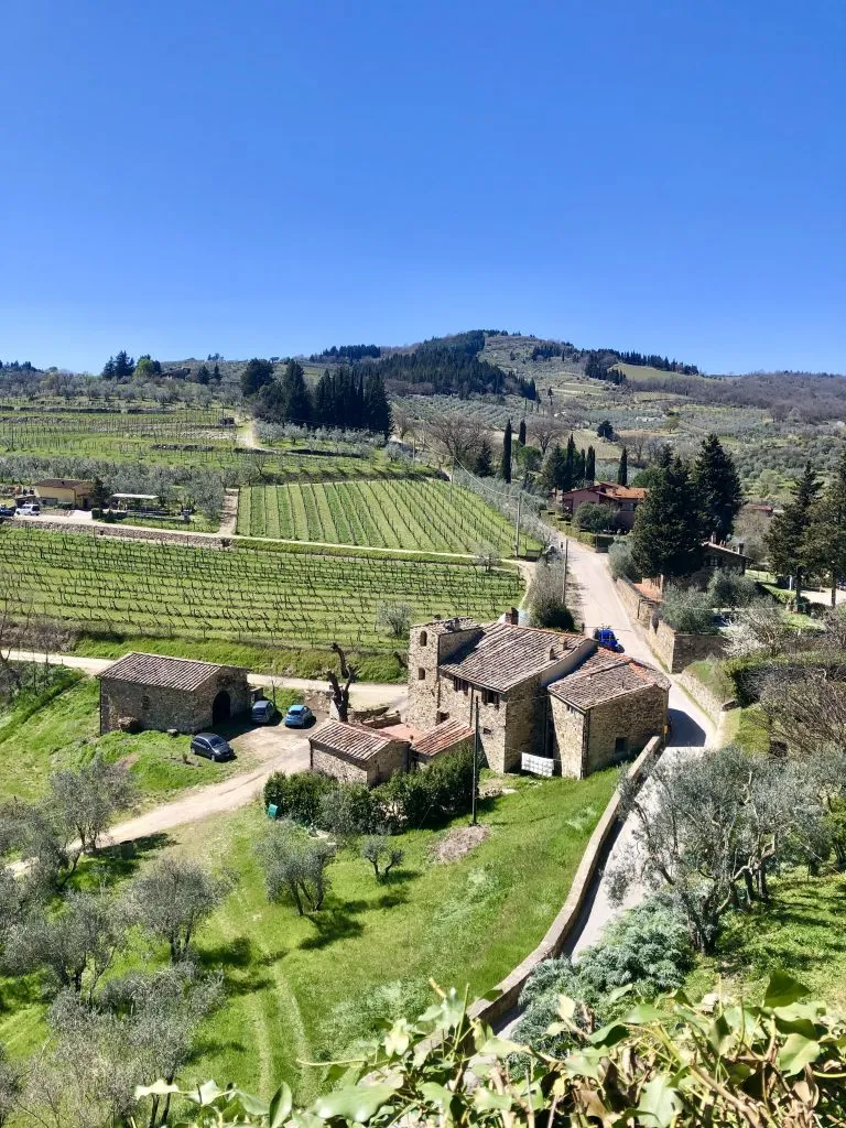 view of chianti vineyards and tuscan farmhouse from above, one of the best attractions montefioralle