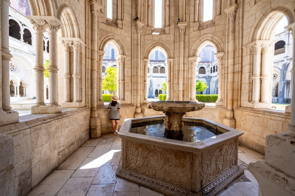 kate storm at alcobaca monastery with renaissance fountain