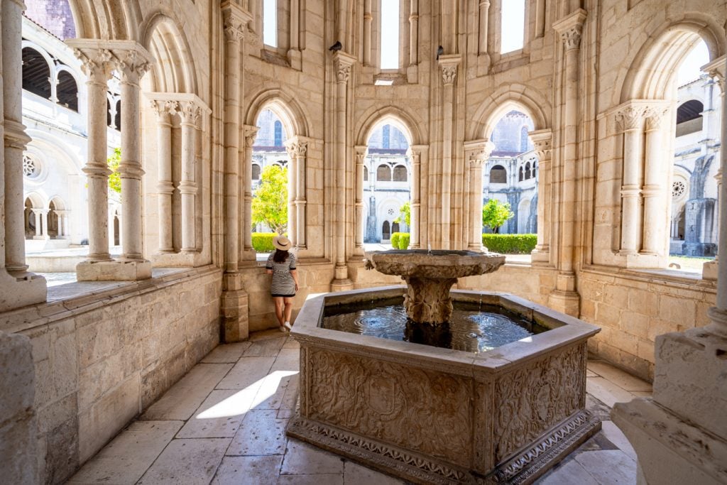 kate storm at alcobaca monastery with renaissance fountain