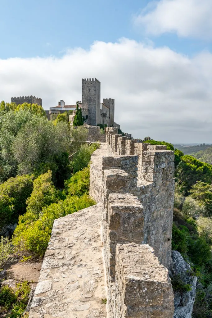 close up of ramparts on obidos castle walls, one of the fun things to do in obidos portugal