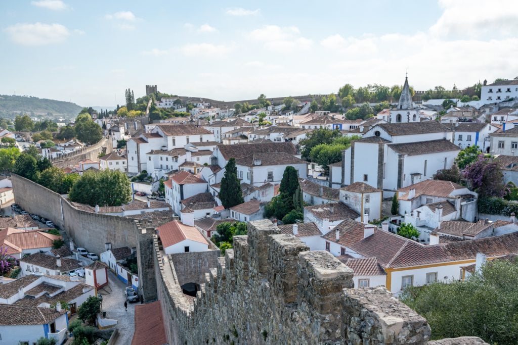 view from the castle walls in obidos portugal, a fun addition to a 2 week portugal and spain itinerary