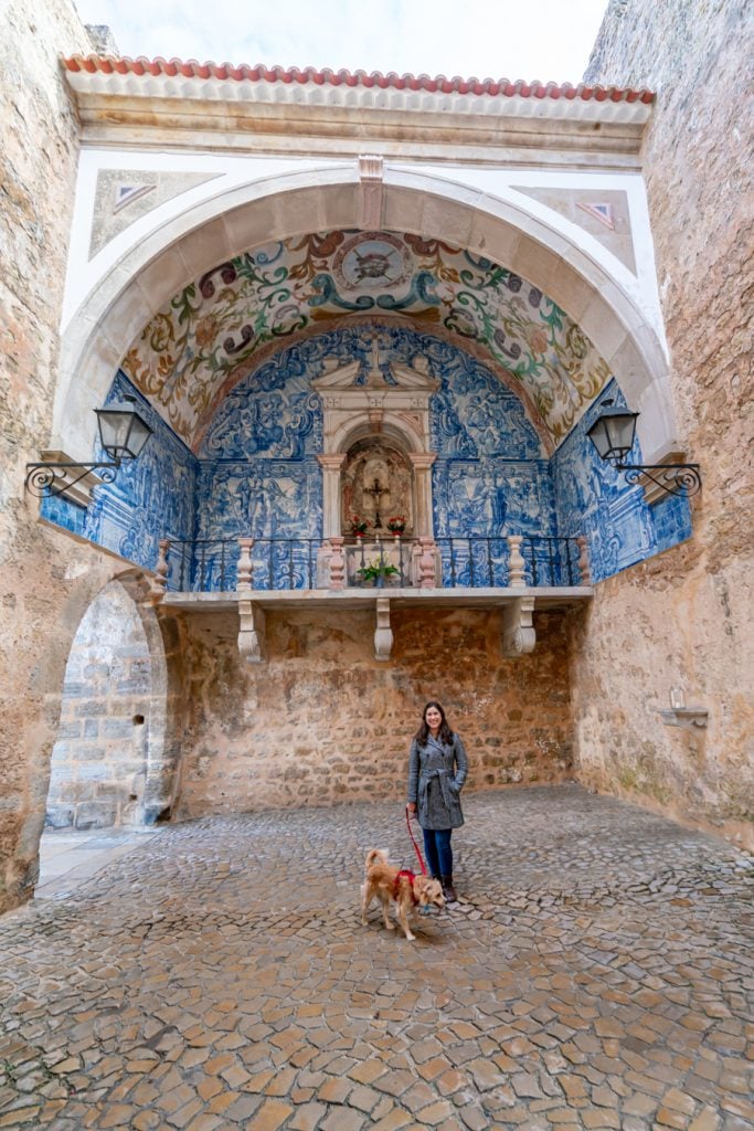 kate storm and ranger storm under porta da vila, one of the best attractions in obidos portugal