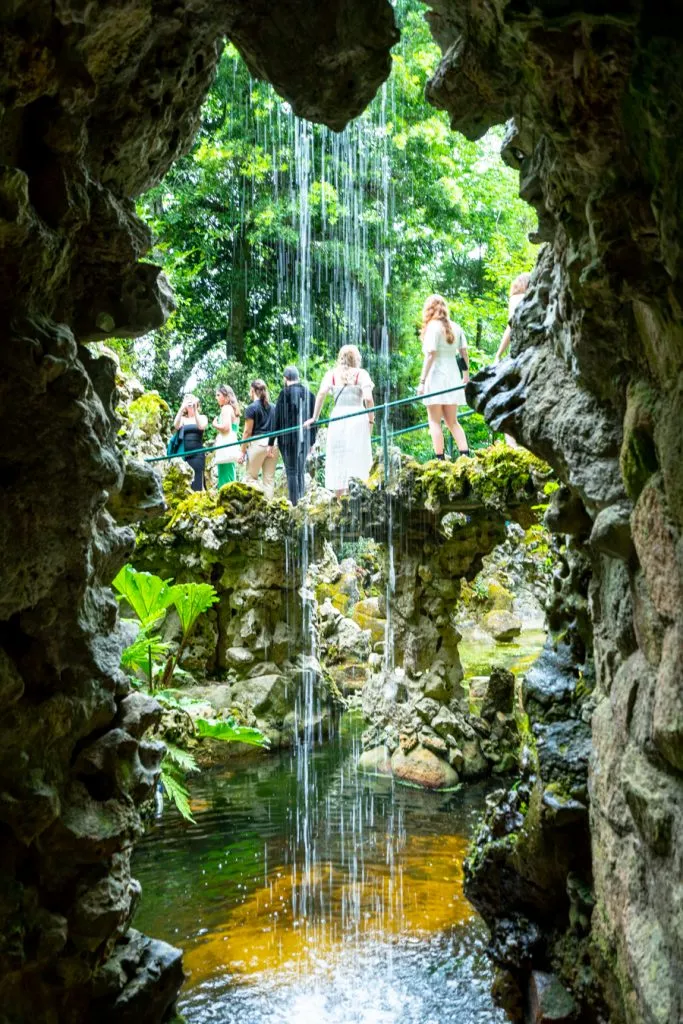 waterfall in a grotto on the grounds of quinta da regaleira, one of the best things to do in sintra in a day