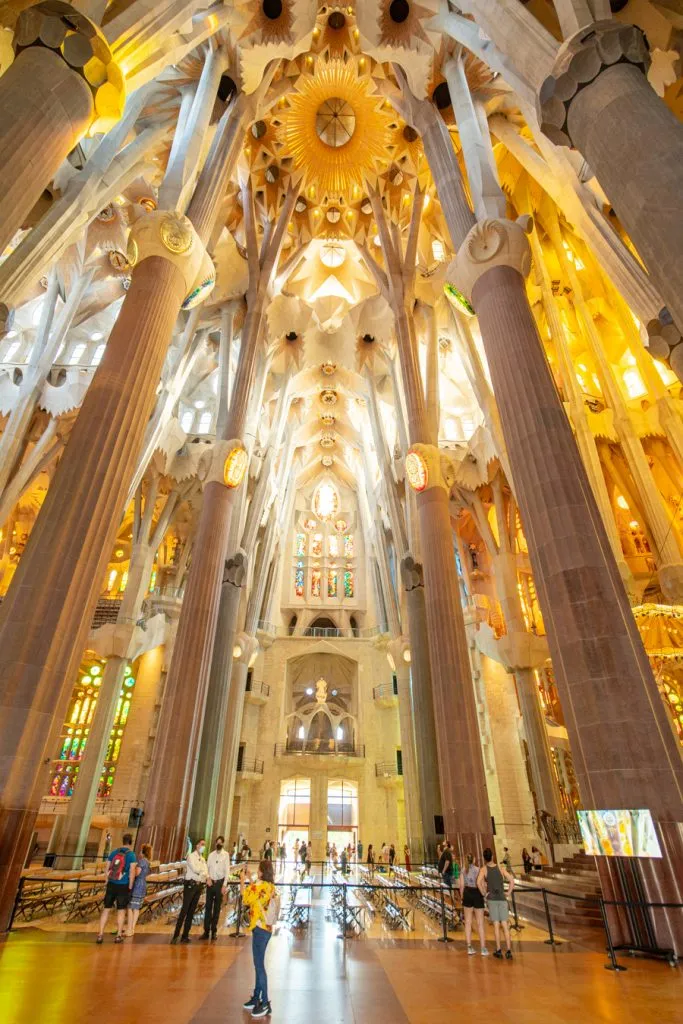 interior of the sagrada familia in barcelona spain, an amazing destination when traveling to europe for the first time