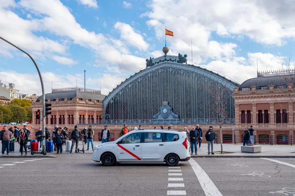 white van in front of the madrid train station