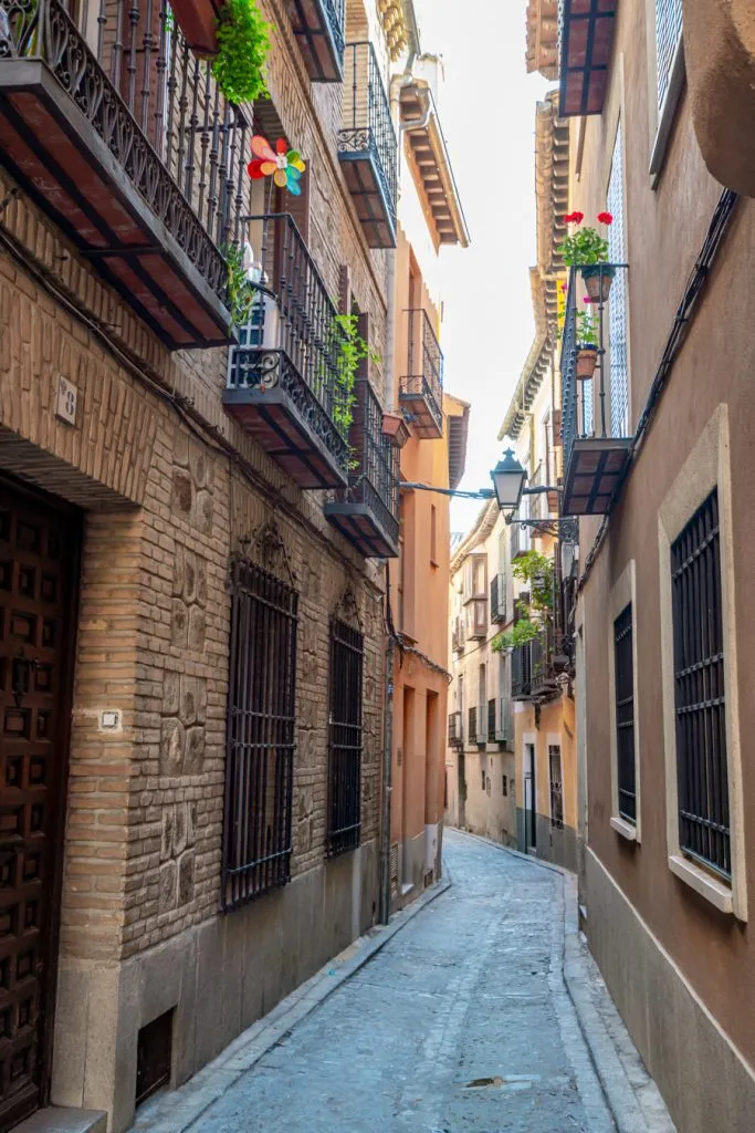 narrow stone street in the historic center of toledo spain