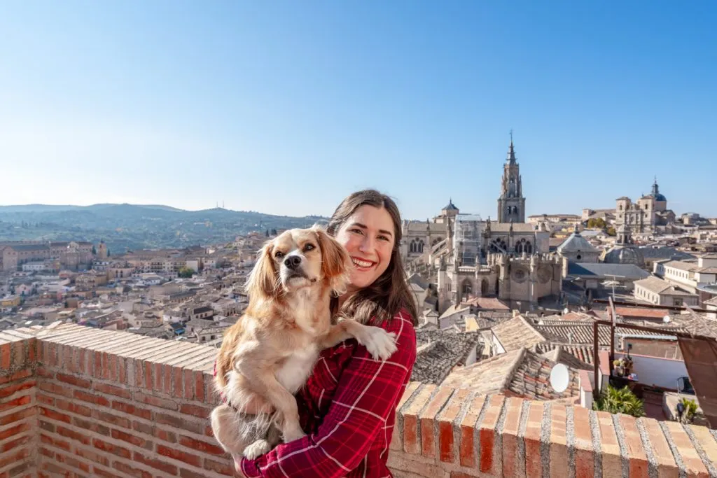 kate storm and ranger storm on a balcony overlooking toledo spain in winter