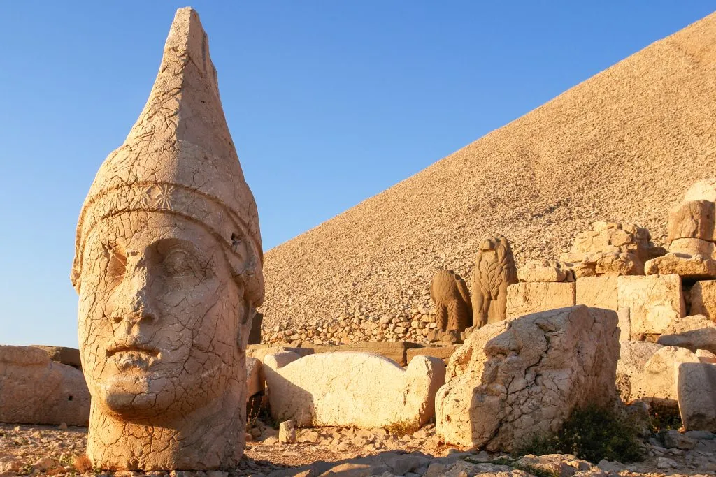 close up of a statue head at mount nemrut in turkey