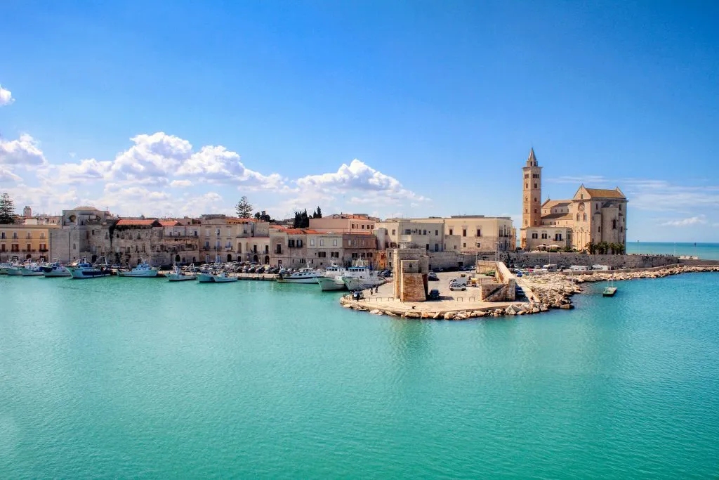 view of trani italy as seen from the water on a sunny day in puglia vacation