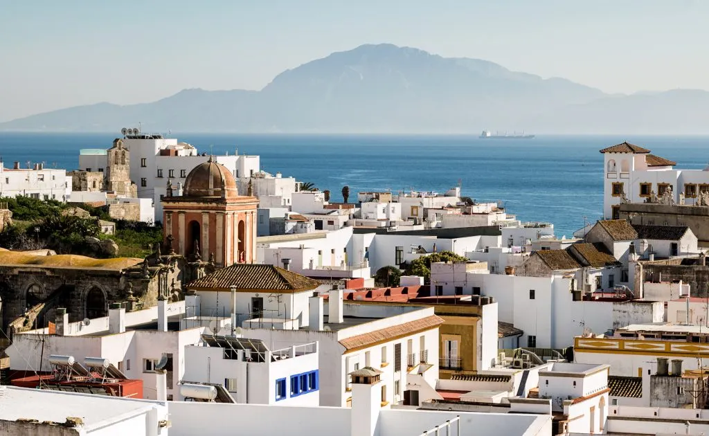 whitewashed town of tarifa spain with africa visible beyond the water