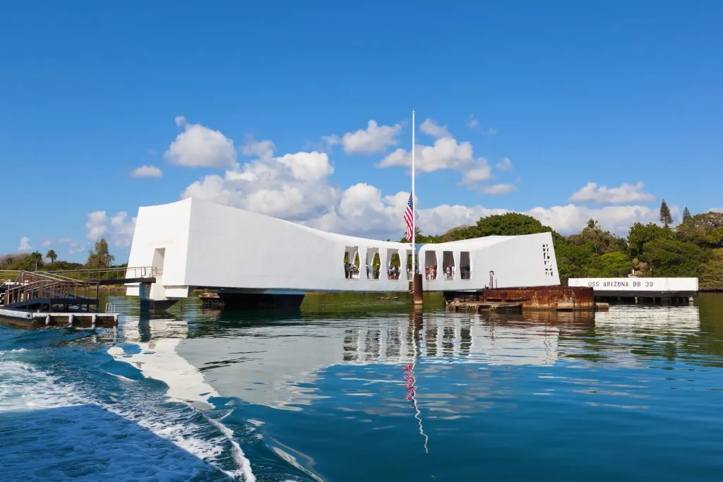 uss arizona memorial as seen from the water at pearl harbor, one of the most important oahu attractions