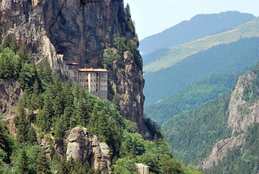 sumela monastery clinging to a cliff in the mountains, one of the prettiest places in turkey to visit