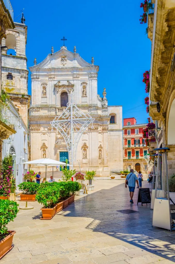 front facade of basilica di san martino in martina franca, one of the prettiest places in puglia to visit