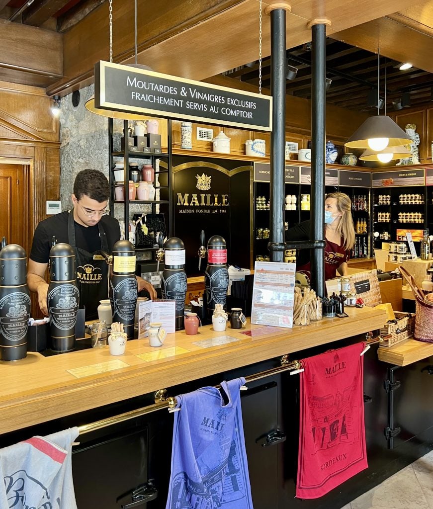 mustard on tap for sale in moutarde maille, one of the fun things to do in dijon france