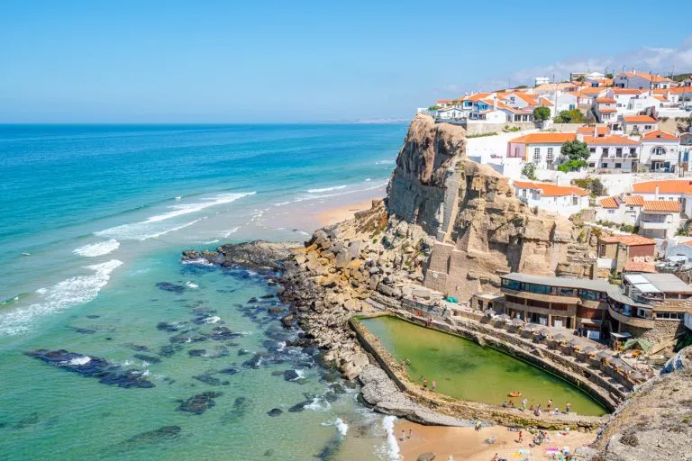 photo of azenhas do mar with ocean pool visible from above, one of the best day trips from lisbon portugal
