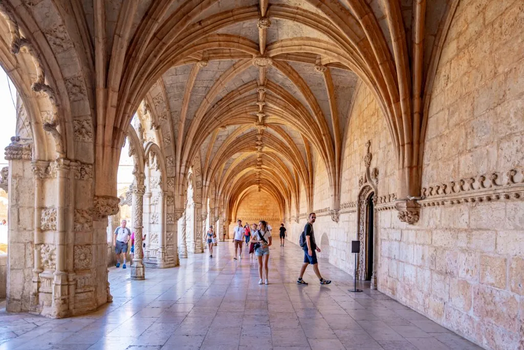 detailed archways in the jeronimos monastery, one of the best things to do in belem lisbon portugal