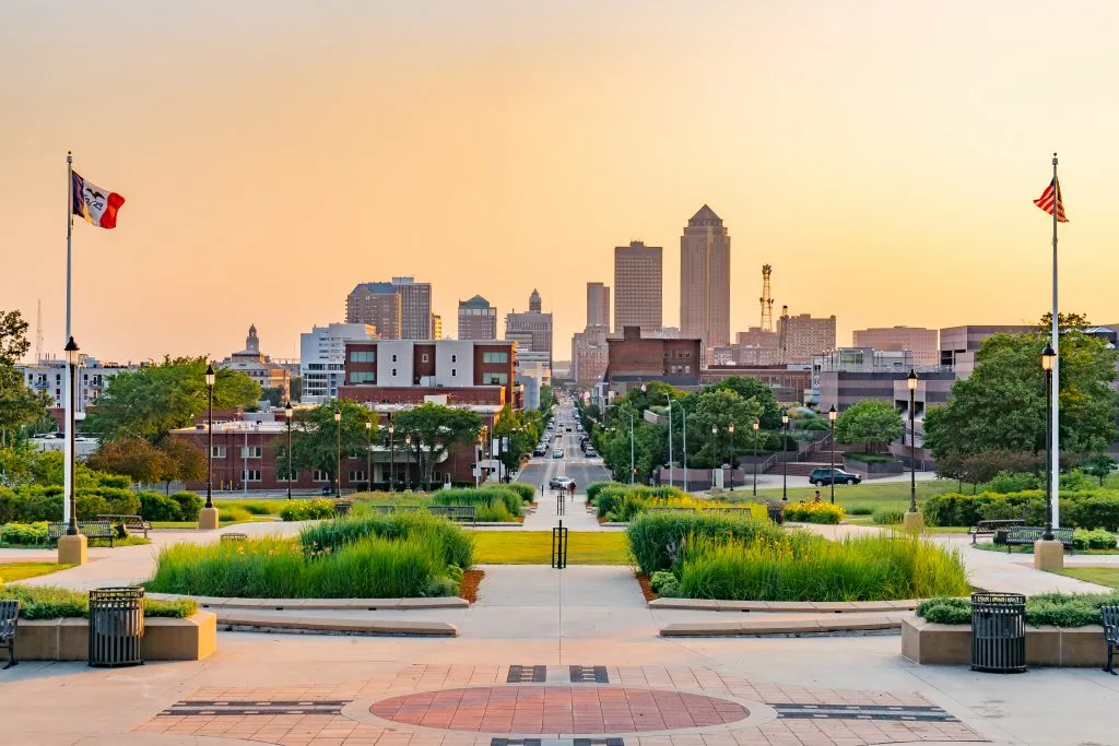 skyline of des moines iowa at sunset, a fun stop on midwest road trip itineraries