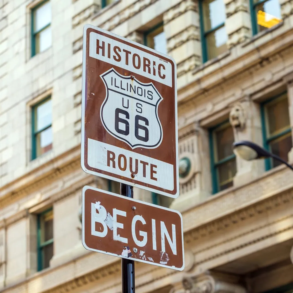 historic route 66 begin sign in chicago, start of one of the top road trips in midwest usa