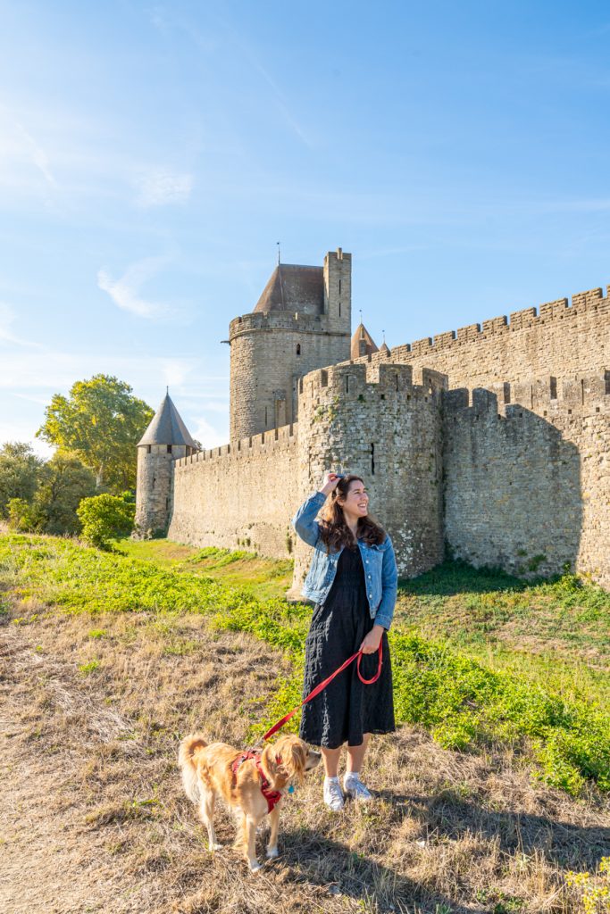 kate storm and ranger storm standing in front of medieval walls of carcassonne france