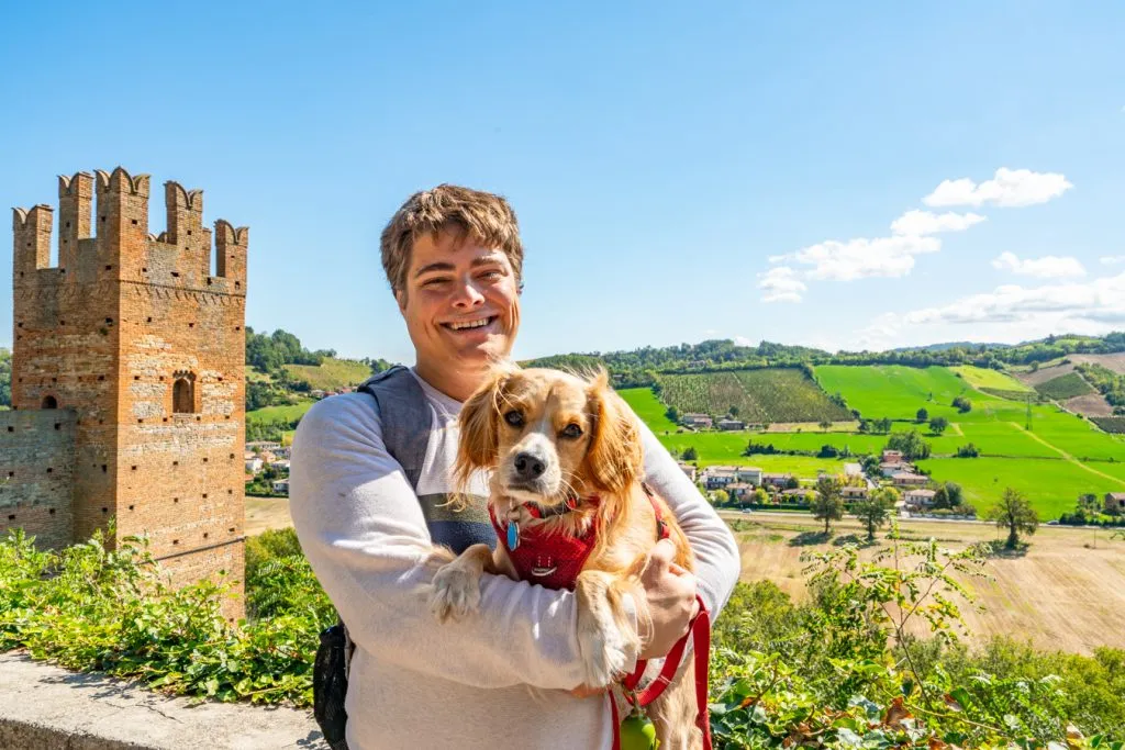 jeremy storm and ranger storm overlooking a view with castell arquato castle in the background