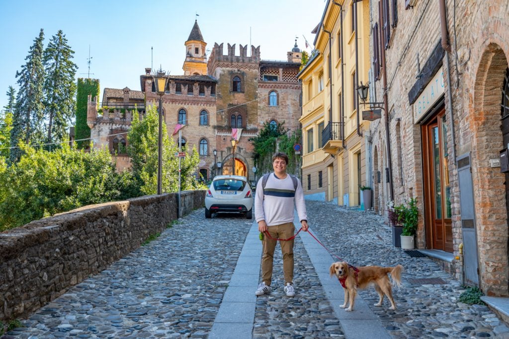 jeremy storm and ranger storm near the entrance gate to the historic center of castellarquato italy