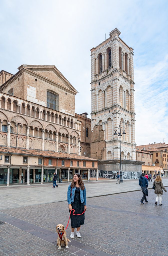 kate storm and ranger storm in ferrara italy piazza with tower in the background