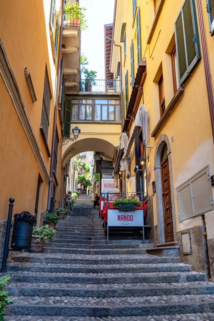 steep stone staircase leading up a walking street lake como italy