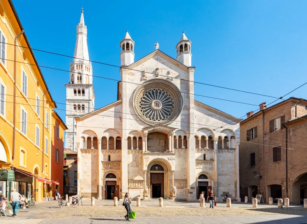 front facade of duomo in modena italy, a wonderful stop during an emilia romagna road trip itinerary