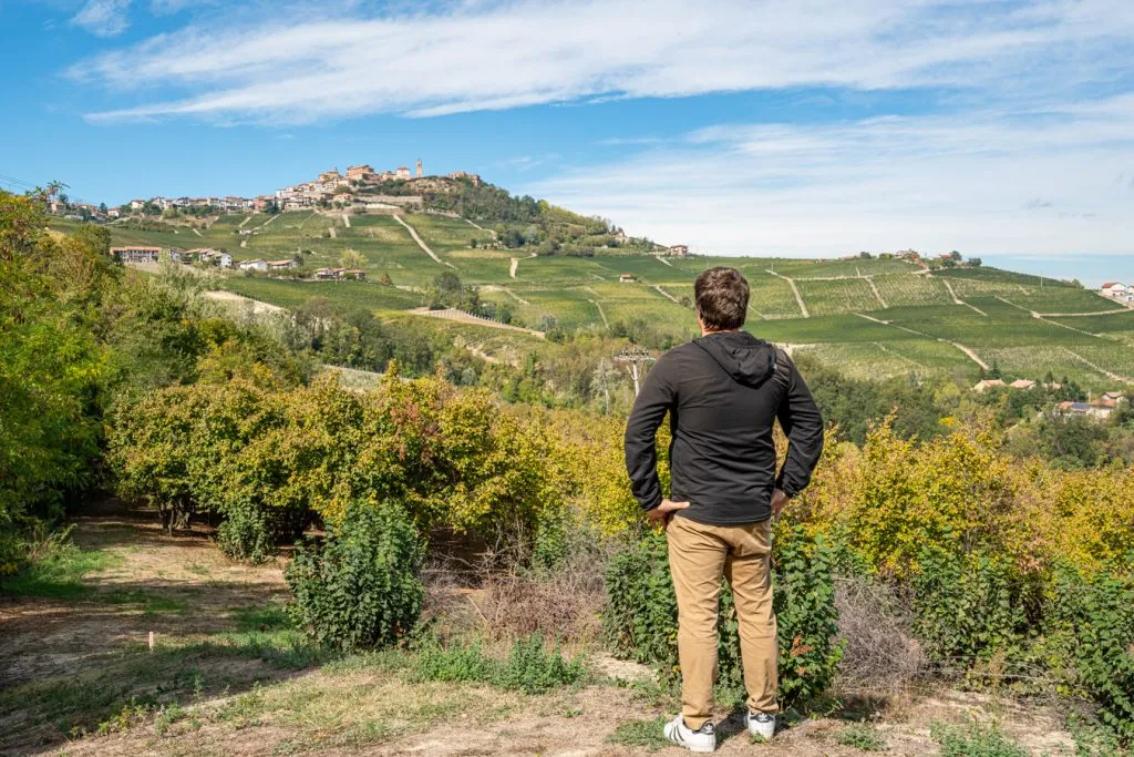 jeremy storm overlooking vineyards and the village of la morra italy