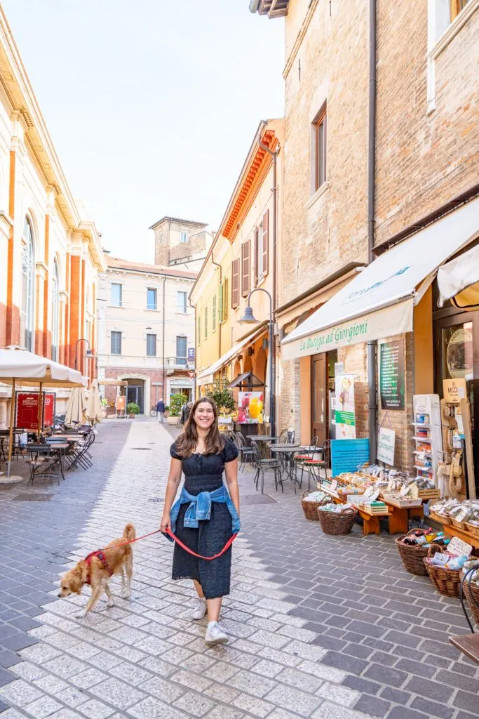 kate storm and ranger storm walking down a street when exploring the best things to do in ravenna italy