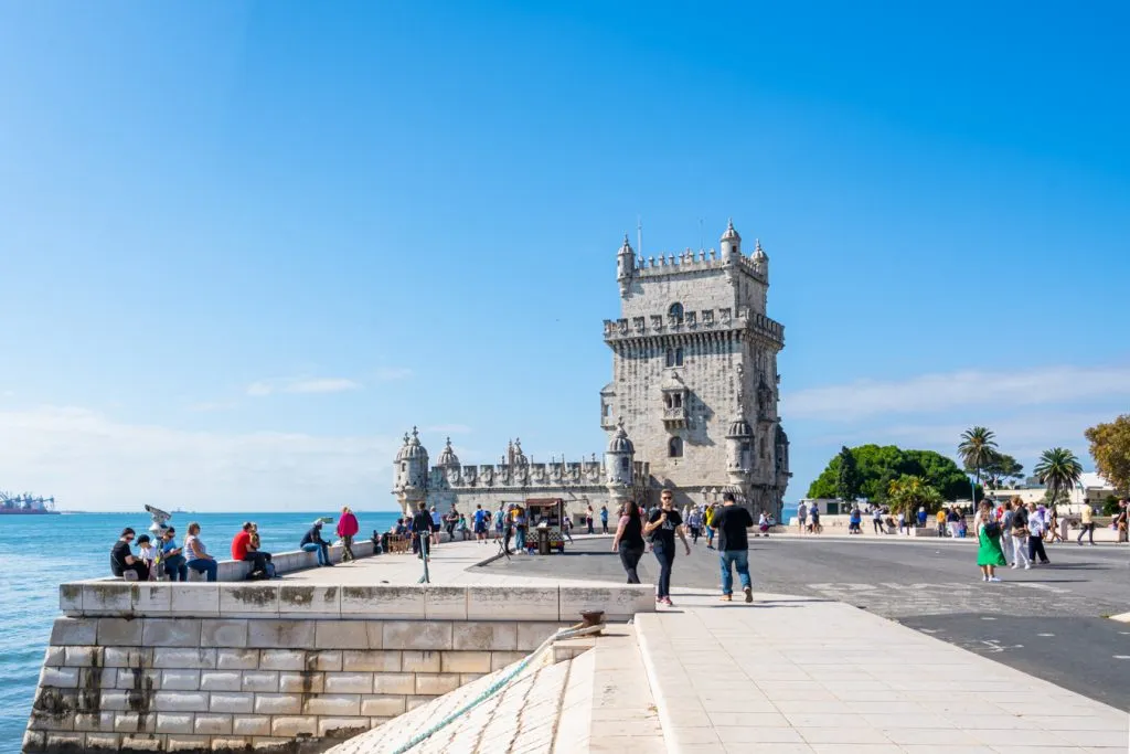 view of belem tower from along the tagus river when approaching it in belem lisbon