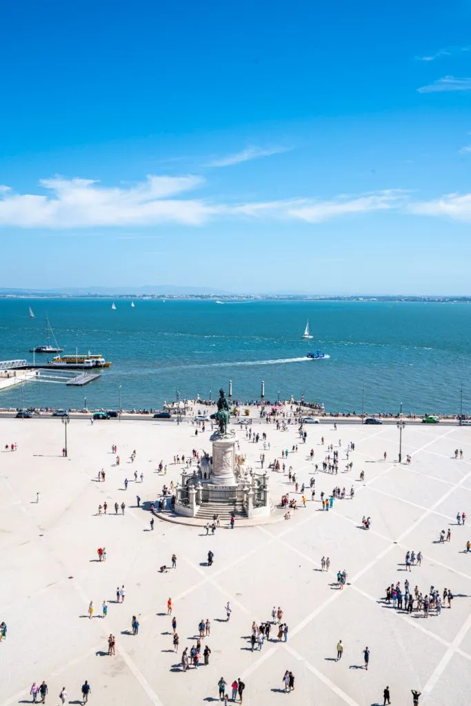 view of praca do comercio from the top of the arch of rua augusta, one of the best lisbon off the beaten path viewpoints