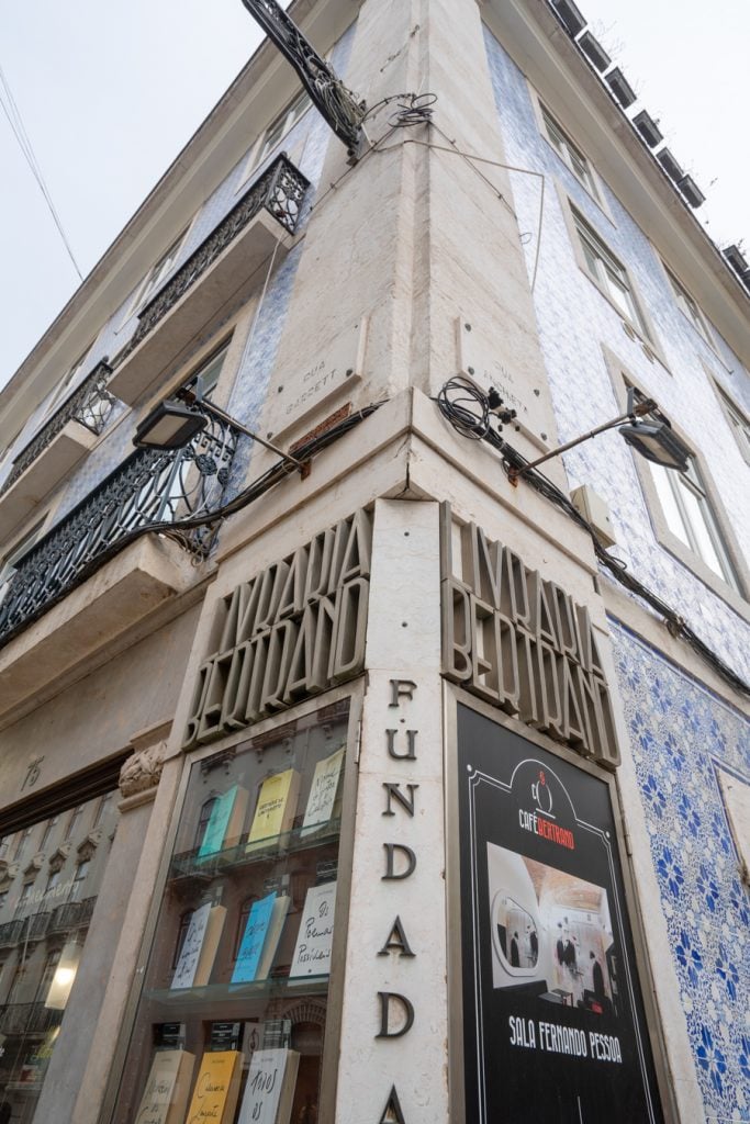 corner view of livraria bertrand lisbon sign
