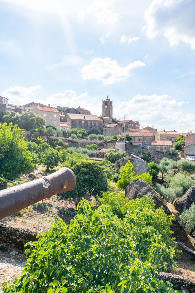 view of monsanto portugal from the miradouro de monsanto parking area