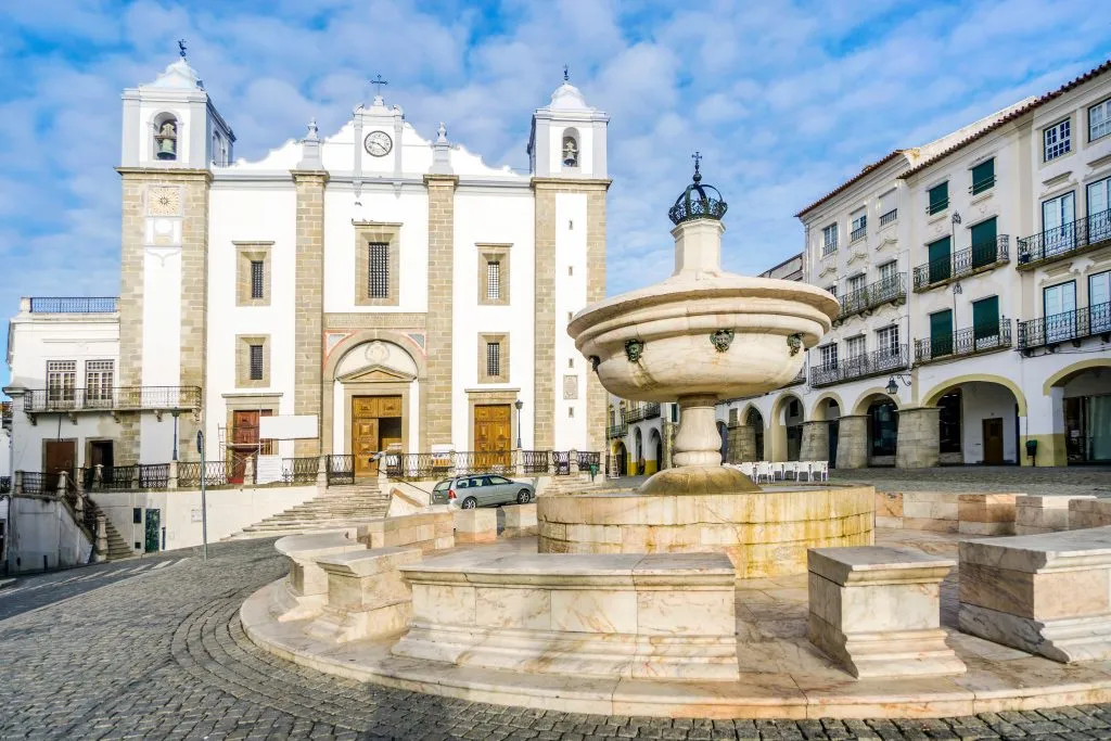 giraldo square with fountain in the foreground and church in the background