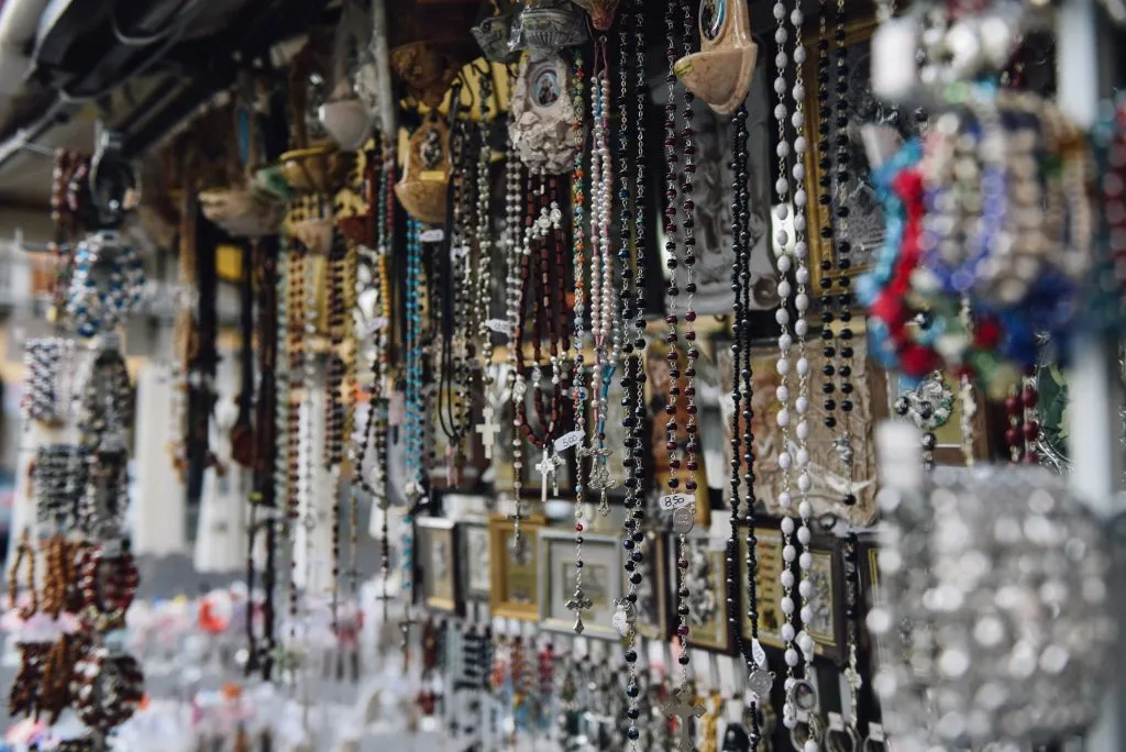 rosaries and other religious items for sale when shopping in rome italy