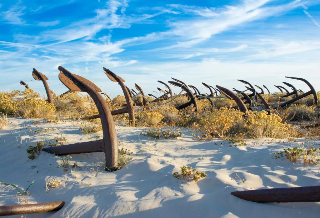 anchor cemetery in the dunes in tavira portugal beach towns to visit