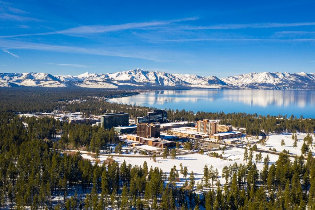 south lake tahoe as seen from above with the lake in the background