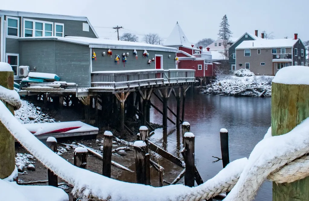 harbor of kennebunkport maine covered in snow during winter