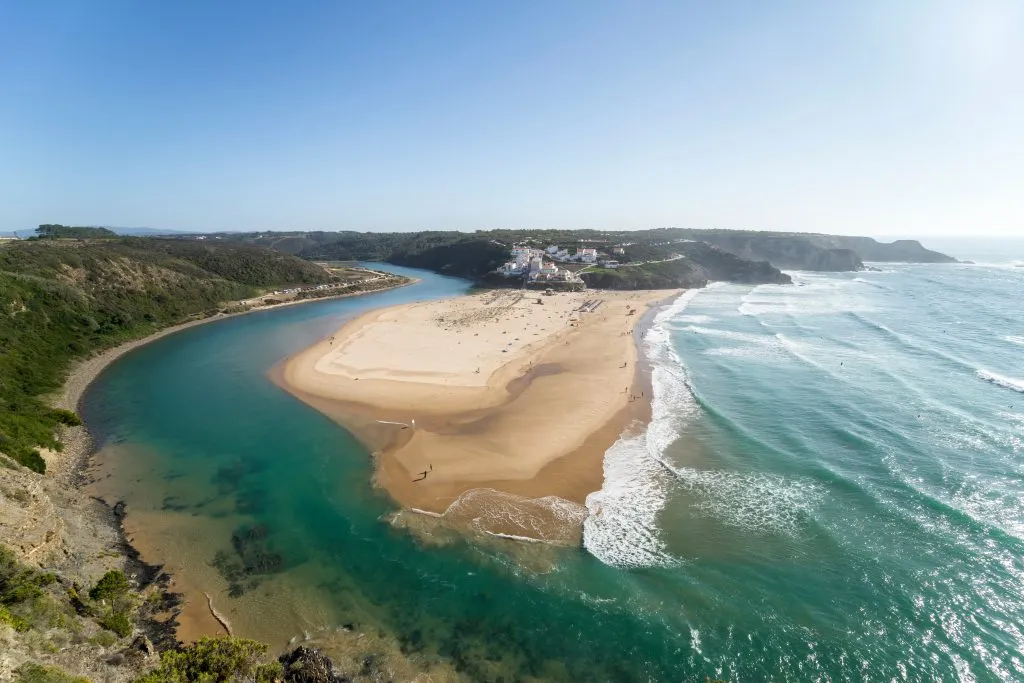 aerial view of Odeceixe horseshoe beach in one of the most beautiful beach towns portugal