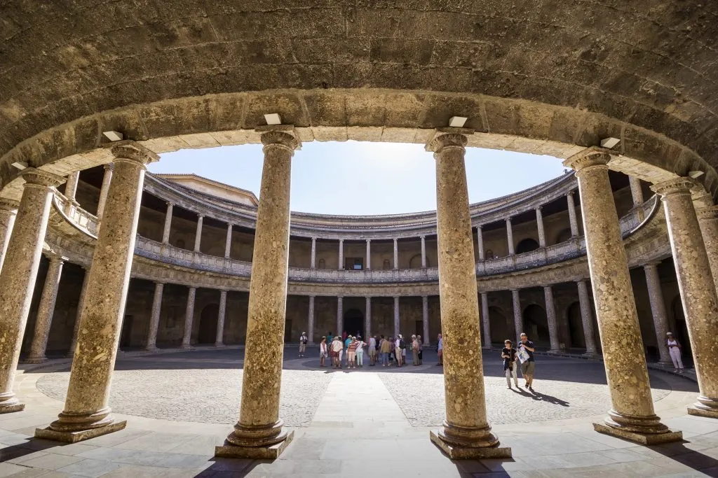 columns surrounding round courtyard in charles v palace alhambra spain