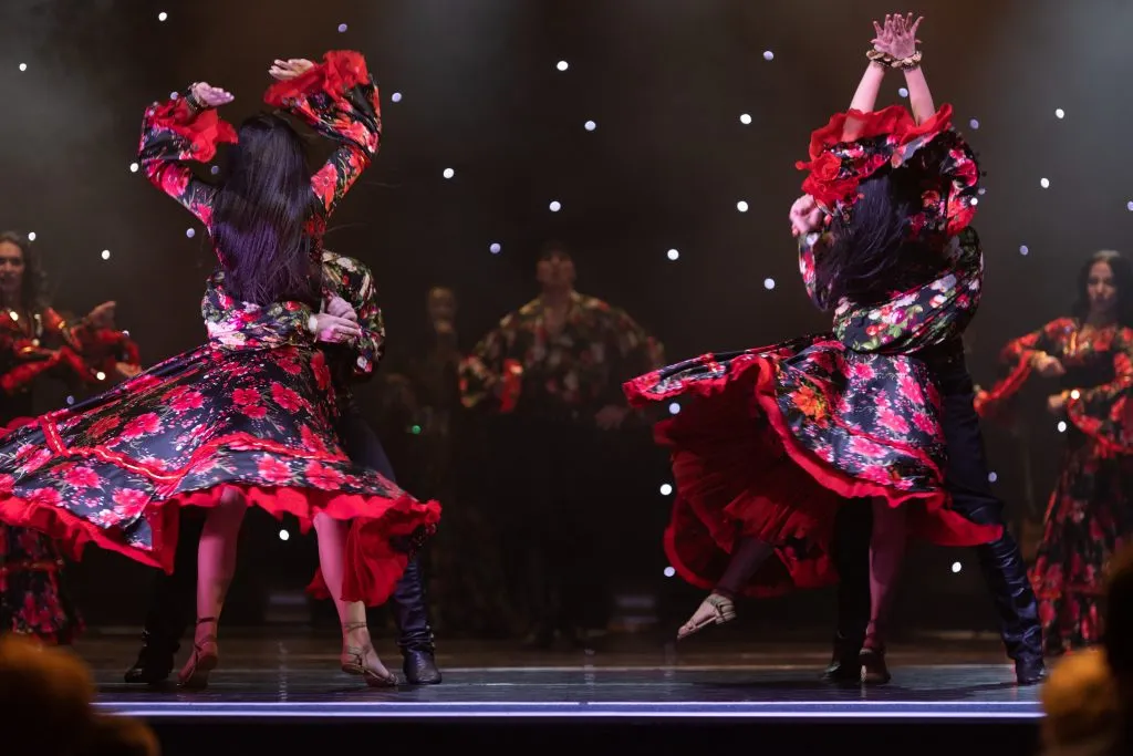 dancers spinning in flamenco dresses in spain flamenco show